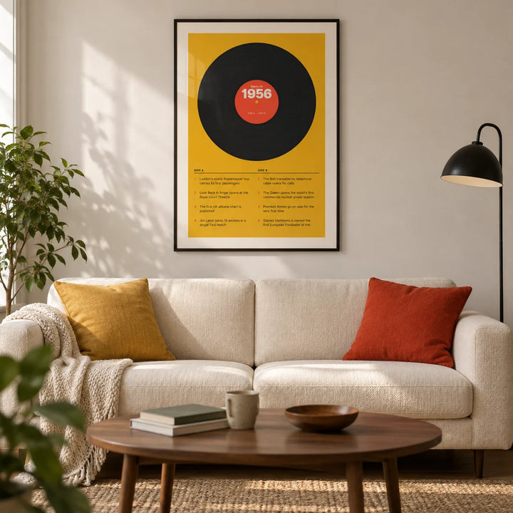 1956 Vinyl Record Print, framed on the wall of a modern retro living room in a British terraced home with a warm white wall and walnut floorboards