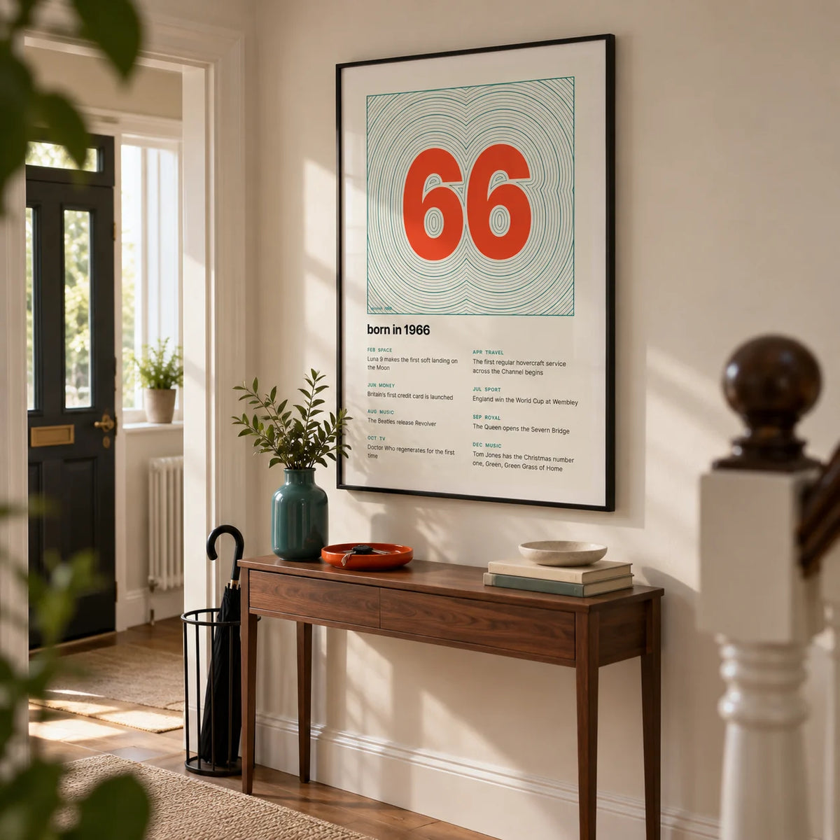1966 Contour Map Print, framed on the wall of a bright hallway in a British terraced home with cream walls and a simple walnut side table