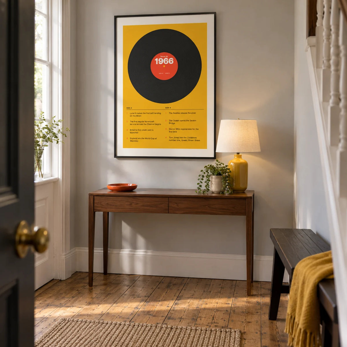 1966 Vinyl Record Print, framed on the wall of a crisp entrance hallway in a British townhouse with a pale grey wall and restored timber floorboards