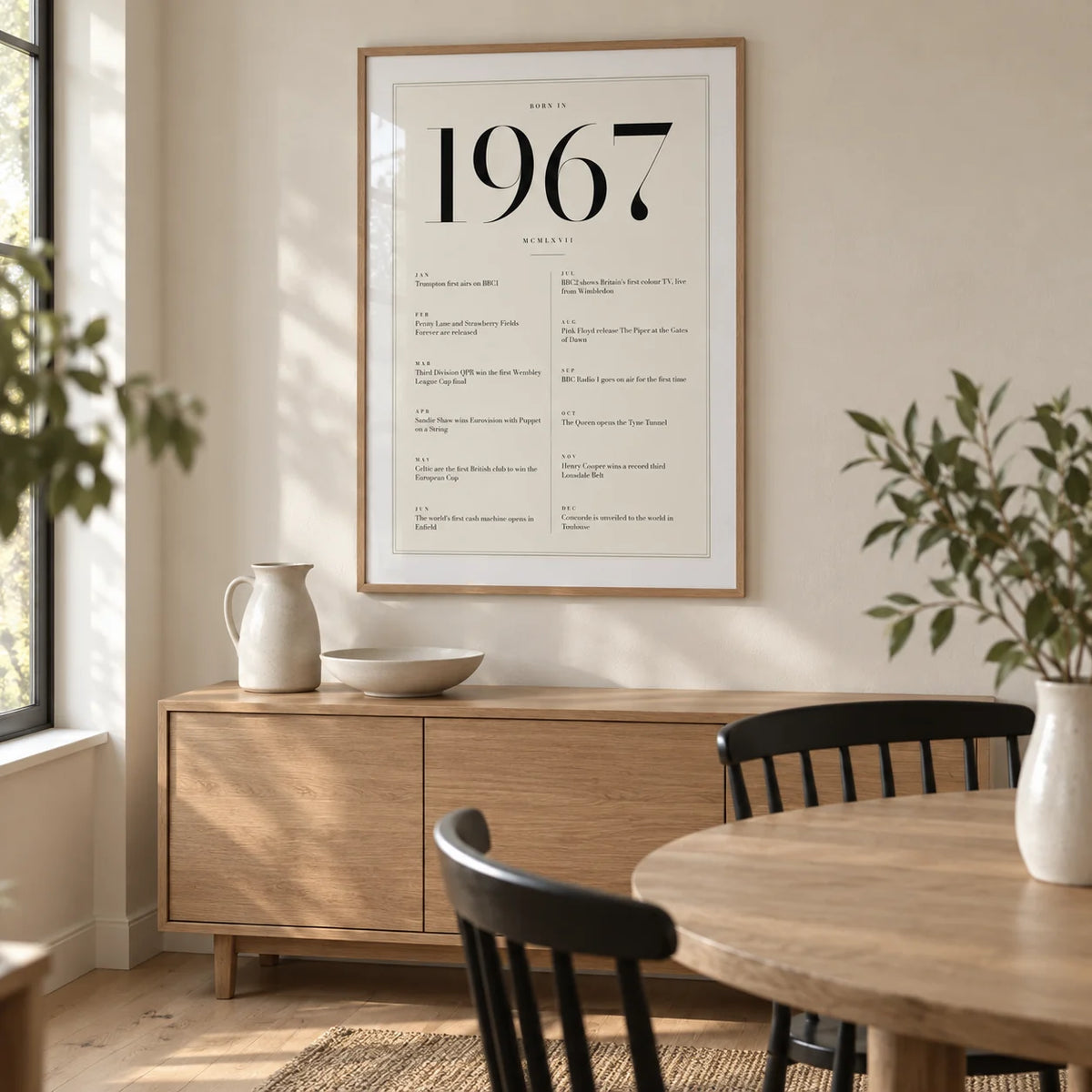 1967 Birthday Print, framed on the wall of a contemporary dining room in an established UK home with an ivory wall and pale oak floorboards