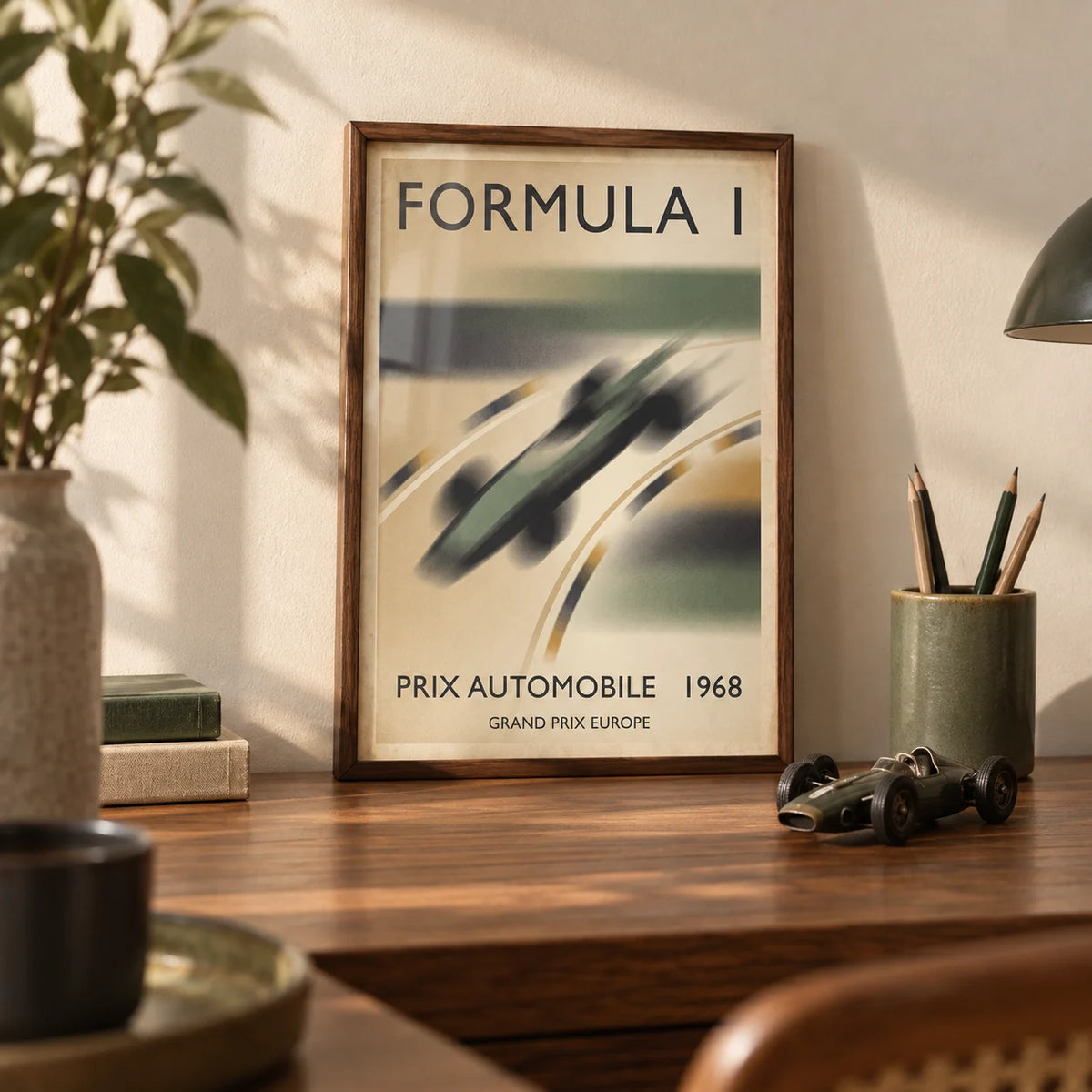 1968 Vintage Racing Poster, a small A4 framed print leaning on a walnut desk