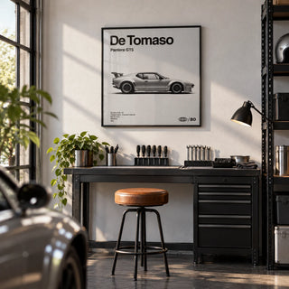 1970s Wedge Sports Car Poster, framed on the wall of a smart converted garage den with a white wall and a dark grey floor