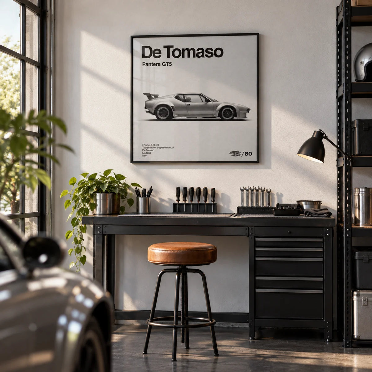 1970s Wedge Sports Car Poster, framed on the wall of a smart converted garage den with a white wall and a dark grey floor