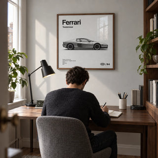 1980s Supercar Poster, framed on the wall of a compact home study in a British terraced house with a pale grey wall and walnut shelving