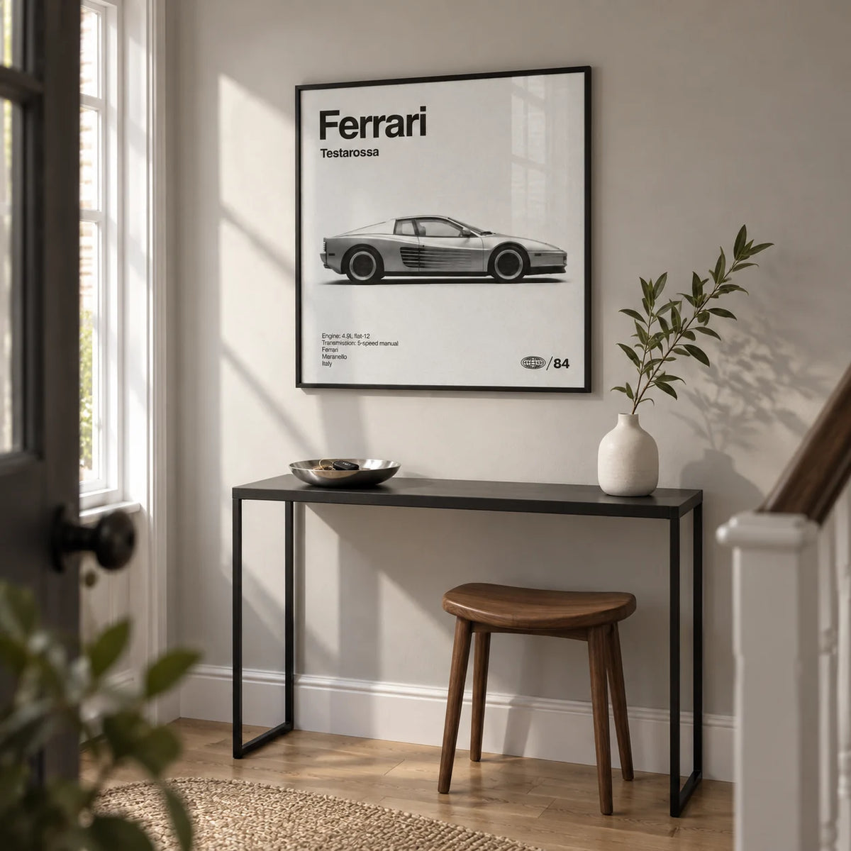 1980s Supercar Poster, framed on the wall of a modern entrance hallway in a renovated British semi-detached home with pale grey walls and oak floorboards