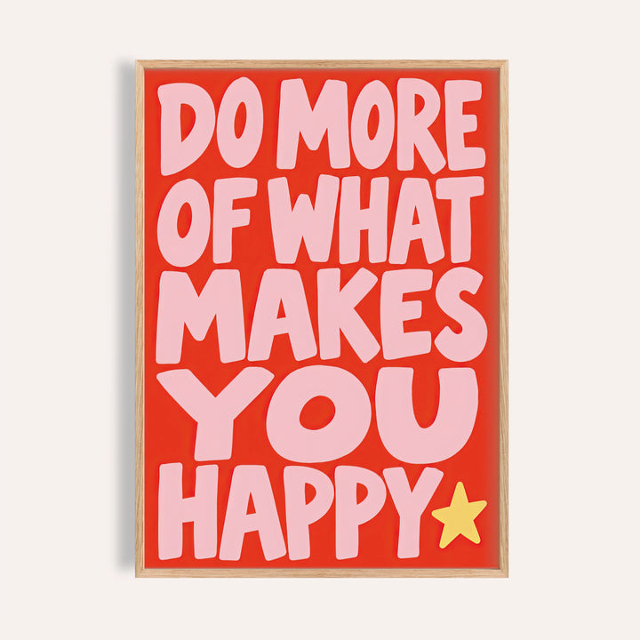 Happiness print reading DO MORE OF WHAT MAKES YOU HAPPY in pink on red