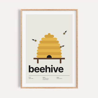 Beehive print shown on a plain warm cream wall