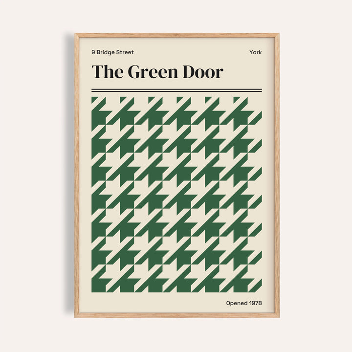 York poster of The Green Door with a large green houndstooth pattern on cream