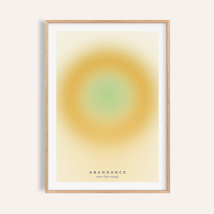Golden yellow aura print shown on a plain warm wall