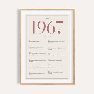 1967 year print with dusty rose numerals on cream on a plain warm wall