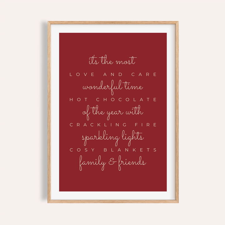 Red most wonderful time quote print shown on a plain warm wall