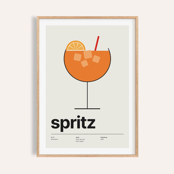 Orange spritz in a balloon glass print shown on a plain warm wall