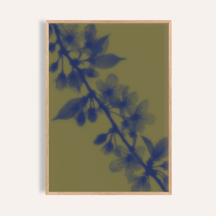 olive cherry blossom print showing cherry blossom in soft focus on olive green