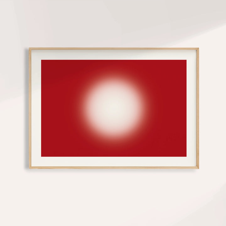 Red abstract wall art with a glowing cream orb on a deep cherry red ground