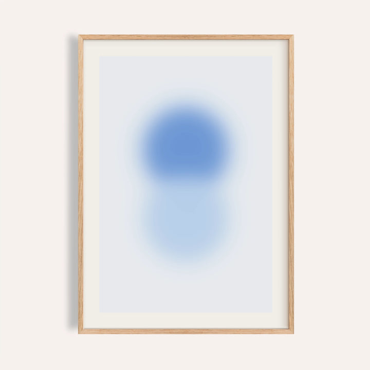 Sky blue print with a cornflower blue orb stacked above a pale blue orb