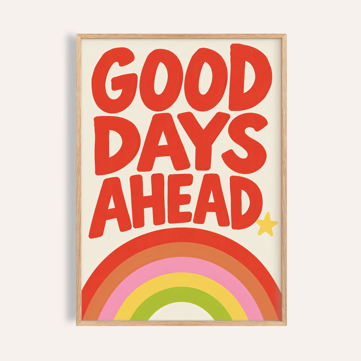 Rainbow print with GOOD DAYS AHEAD in red hand lettering above a bright rainbow