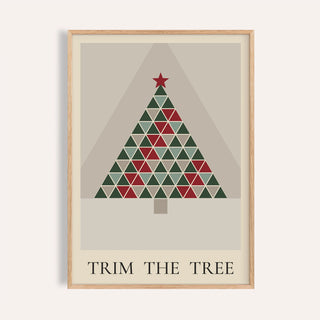 Patchwork quilt Christmas tree print shown on a plain warm wall