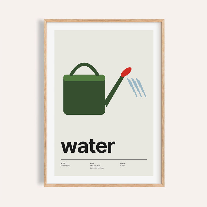 Watering can garden poster shown on a plain warm cream wall