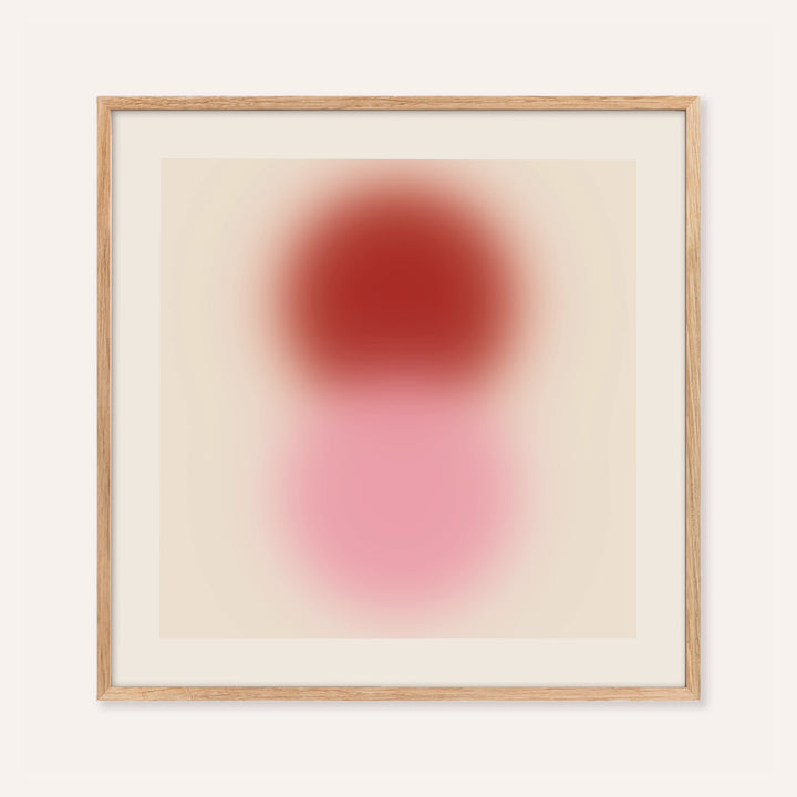 Pink and red print with a cherry red orb stacked above a soft pink orb