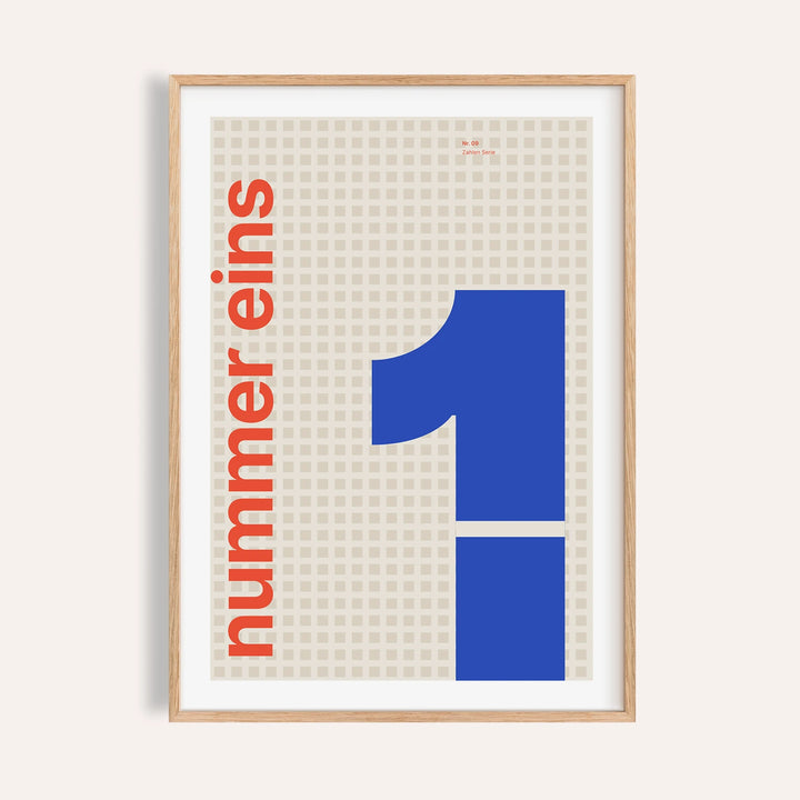 Giant cobalt number 1 print shown on a plain warm wall