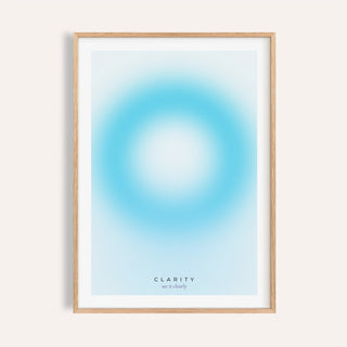 Pale cyan aura print shown on a plain warm wall