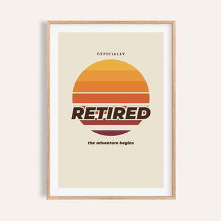 Retro sunset retired print shown on a plain warm cream wall