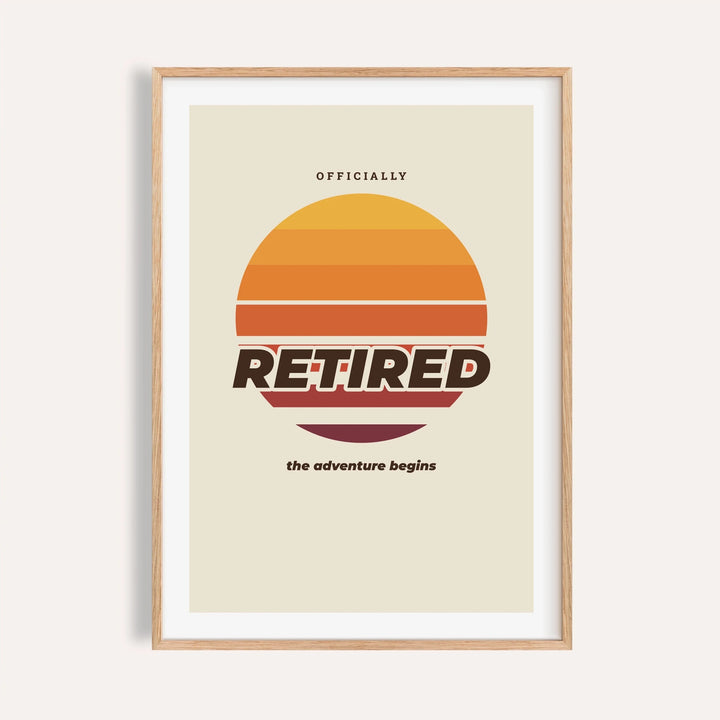 Retro sunset retired print shown on a plain warm cream wall
