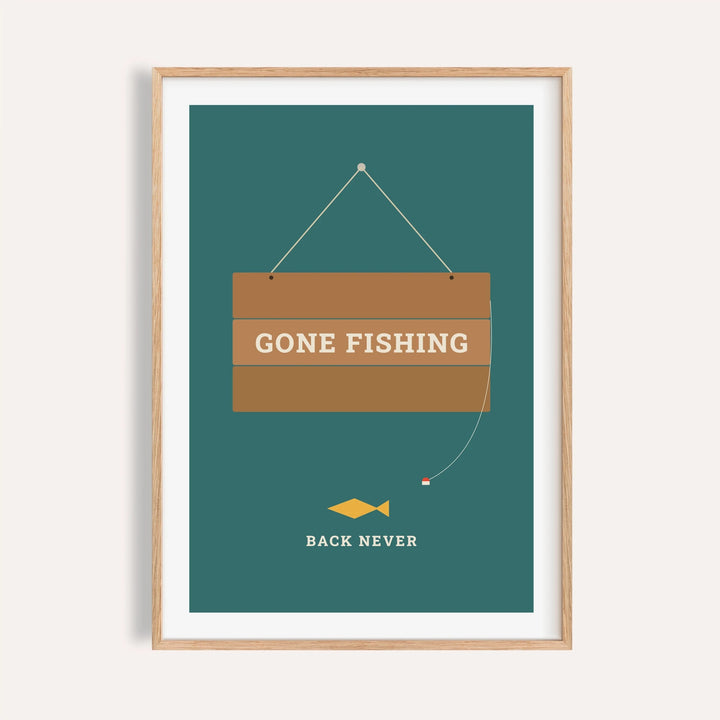 Gone fishing sign print shown on a plain warm cream wall