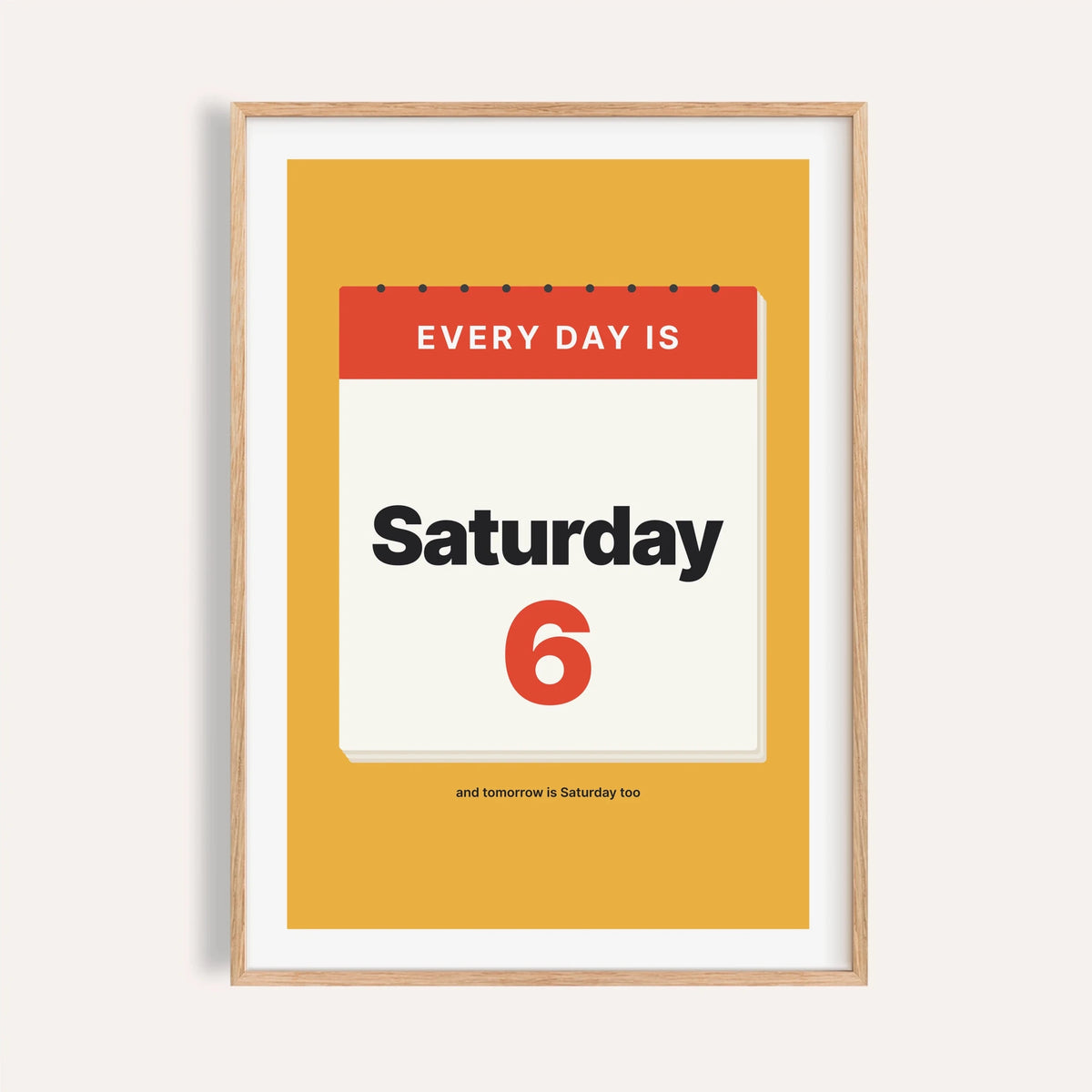 Every day is Saturday print shown on a plain warm cream wall