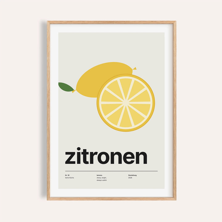 Whole lemon and lemon slice print shown on a plain warm wall
