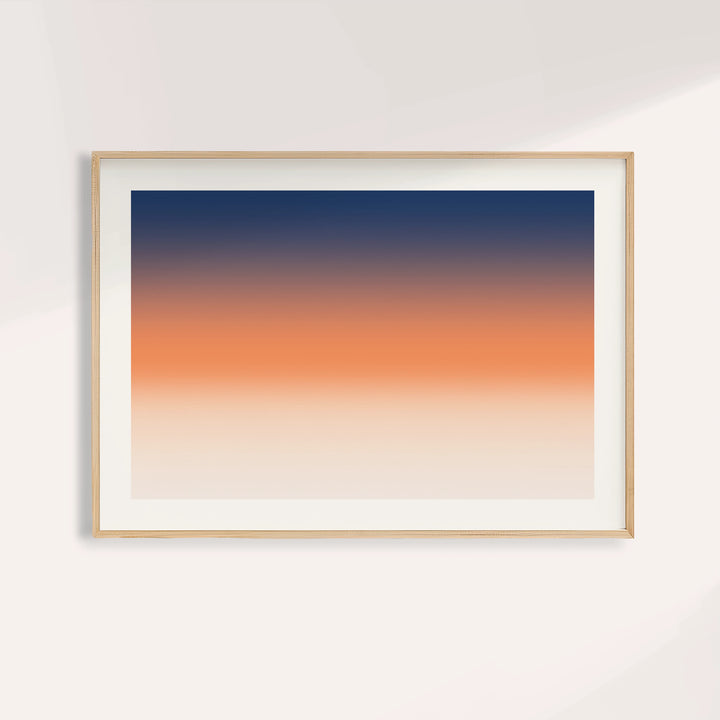 Ocean sunset poster fading from deep navy into a soft orange band and peach