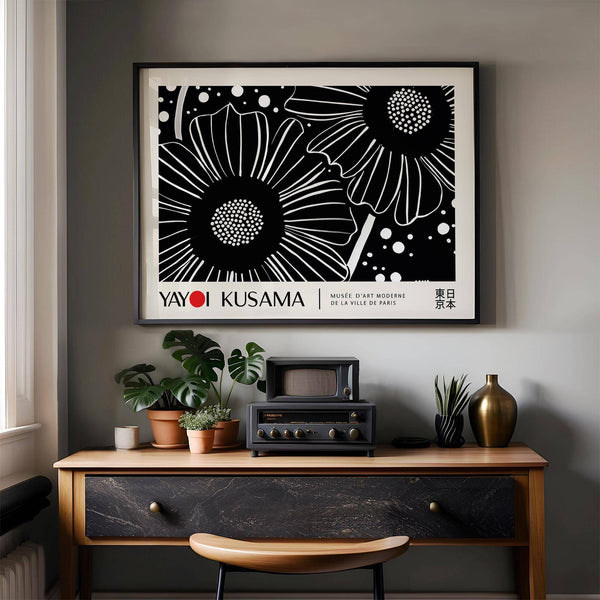 Long black and white floral poster used as horizontal wall hanging