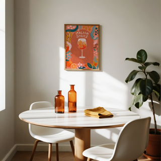Painterly kitchen wall art print with spritz cocktail in a stemmed glass and patterned border elements