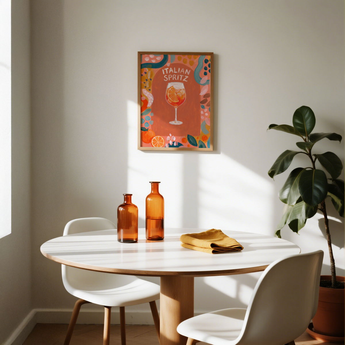 Painterly kitchen wall art print with spritz cocktail in a stemmed glass and patterned border elements