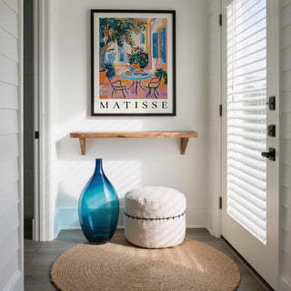 French-style patio featured in this wall art Mediterranean artwork with potted plants.