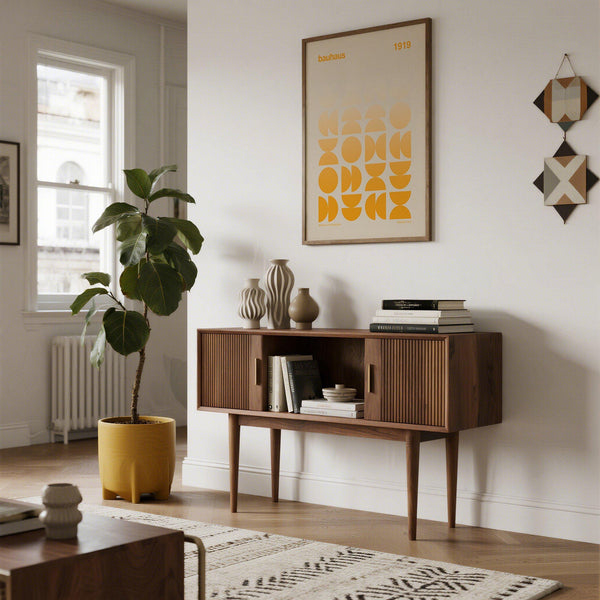 Posters Bauhaus artwork in a modern office with clean-lined furniture.