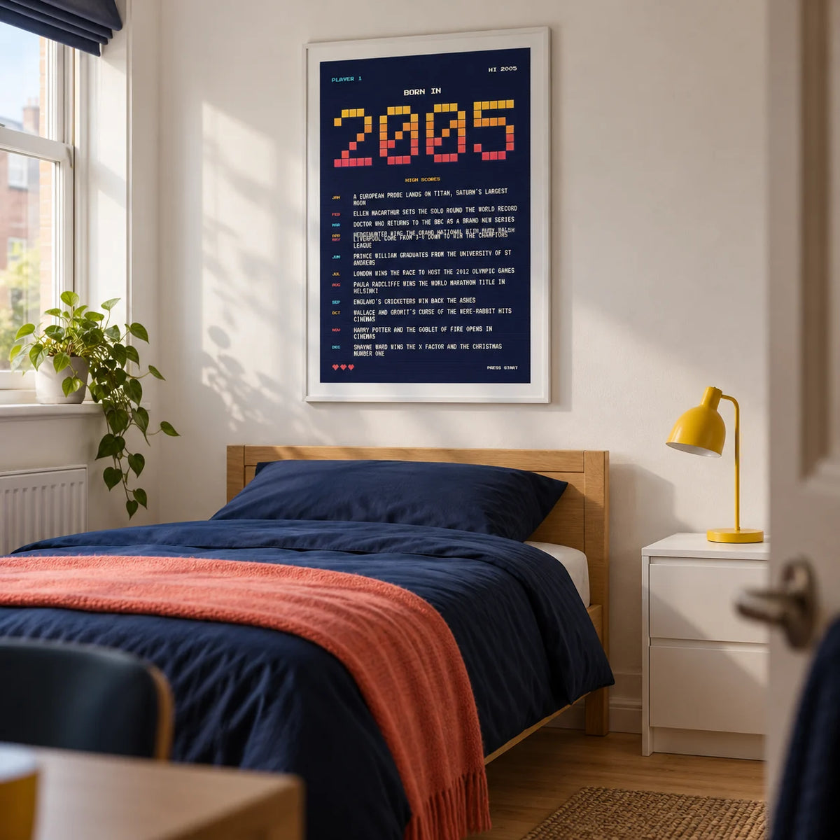 2005 Pixel Art Print, framed on the wall of a modern single bedroom for a university student aged 20-21 in a UK house share