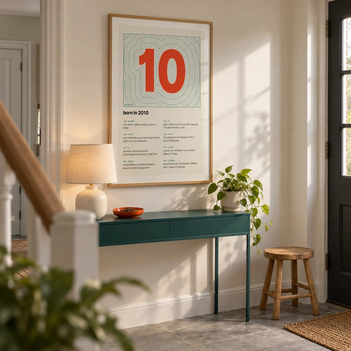 2010 Contour Map Print, framed on the wall of a welcoming contemporary hallway in a British semi-detached home with a warm white wall and plain grey stone floor