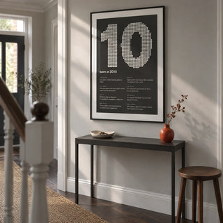 2010 Halftone Print, framed on the wall of a contemporary hallway in a UK terraced house with a pale grey wall and dark wood floor