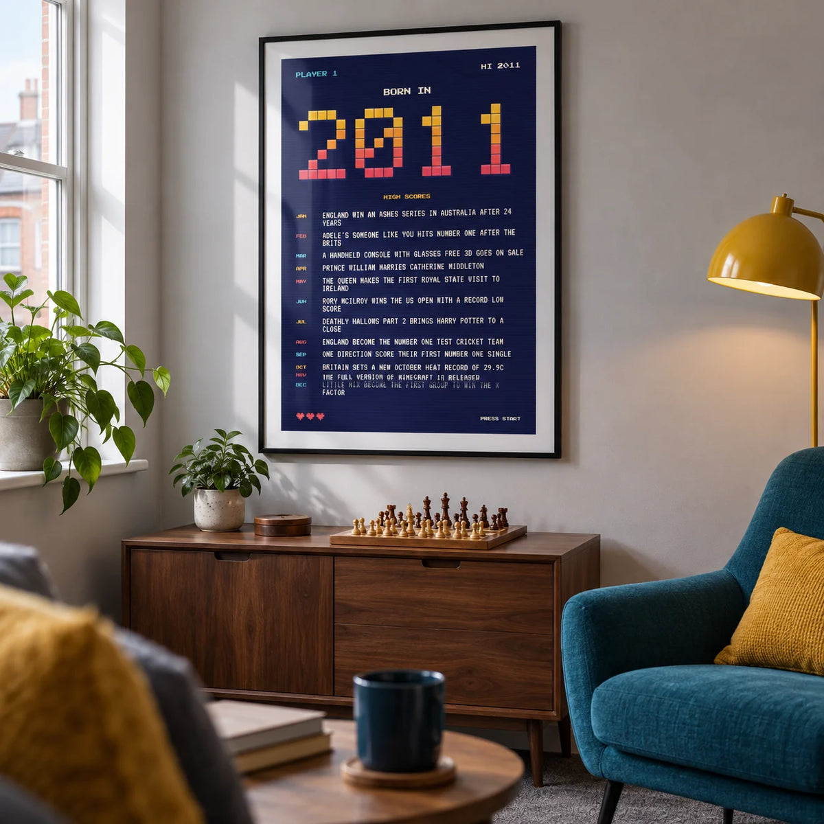 2011 Pixel Art Print, framed on the wall of a small games snug in a UK terraced house with a pale grey wall and simple charcoal carpet in a living room