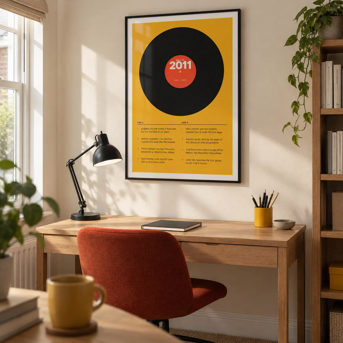 2011 Vinyl Record Print, framed on the wall of a compact modern home study in a British semi-detached house with a cream wall