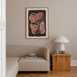 Close-up of abstract wall art print showing chalky texture on red shapes and white drawn line