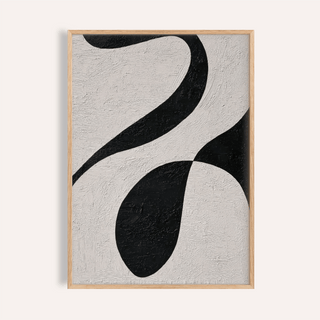 Framed Abstract Black and White Art showing a textured black abstract shape on a white background