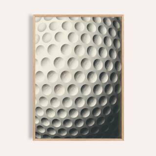 Close-up golf ball dimple pattern wall art print with grainy shading