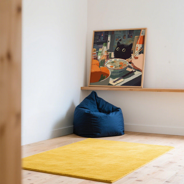 Retro-style ramen wall art featuring a wide-eyed cat and tabletop condiments.