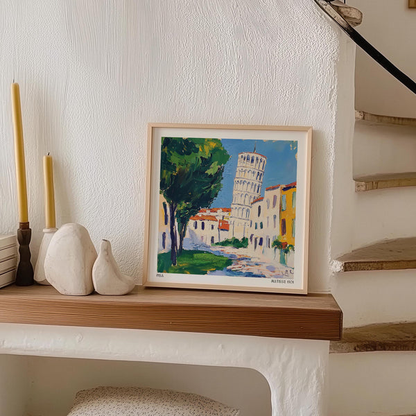 Colorful Pisa print with bright buildings and the Leaning Tower in view.
