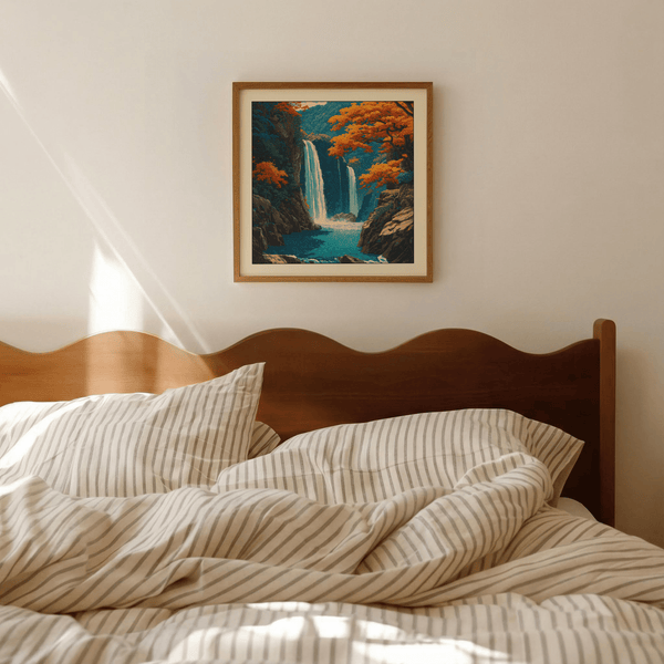 Entryway shelf holding framed print with cascading water motif