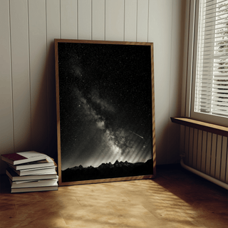 Minimalist celestial photograph print featuring jagged ridge beneath a luminous star cluster
