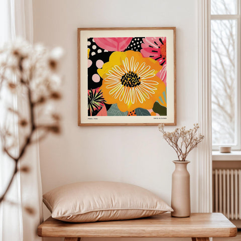 Yellow and pink flower wall art with modern accents.