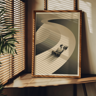 Graphic motorsport wall art print featuring a lone race car entering a wide bend